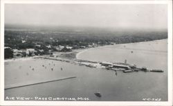 Air View of waterfront with piers, boats, and coastal buildings Postcard