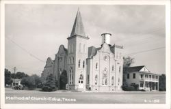 Methodist Church with Steeple and Edna Water Tower Postcard