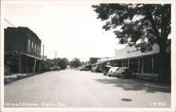 Street Scene with Vintage Cars and Shops Postcard