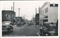 1958 Downtown Street Scene with Vintage Cars and Shops Postcard