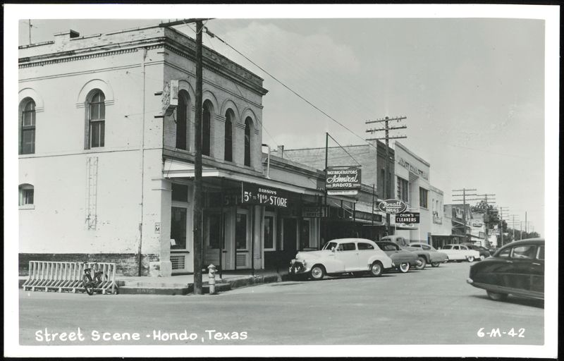 Street Scene with Businesses and Cars, Hondo Texas