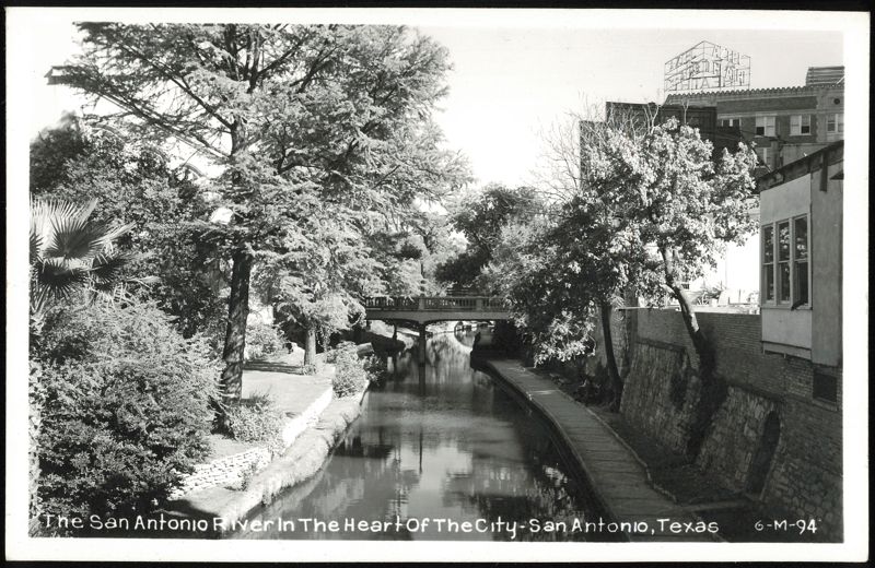 San Antonio River in the Heart of the City, Aztec Theatre sign visible Texas