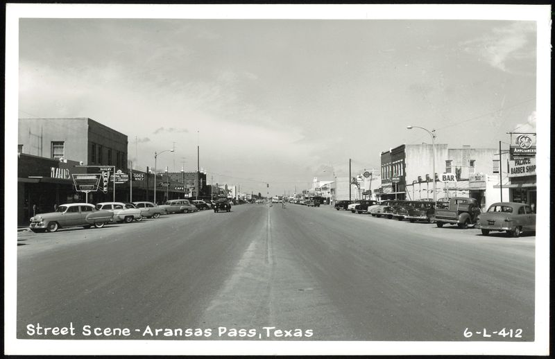 Street Scene with Cars and Businesses Aransas Pass Texas