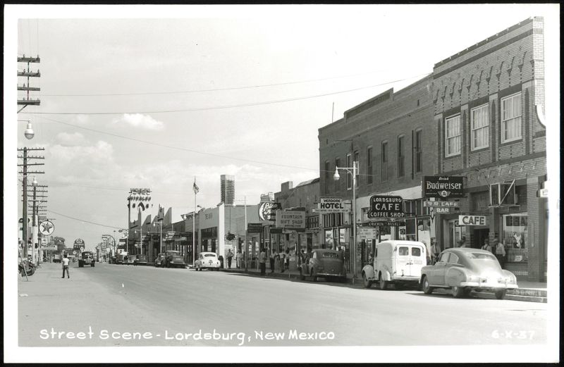 Downtown Street Scene with Businesses and Cars Lordsburg New Mexico