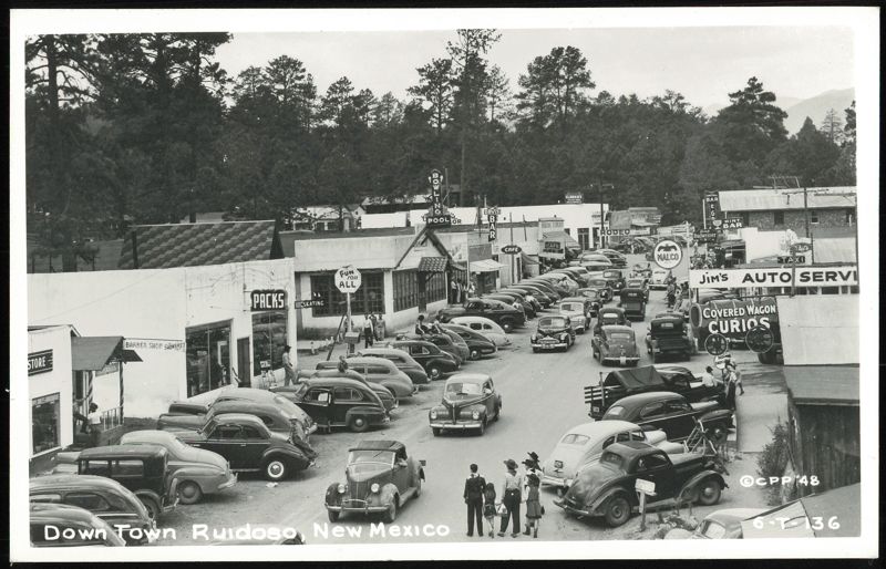 Downtown Ruidoso Street Scene with Vintage Cars and Shops New Mexico