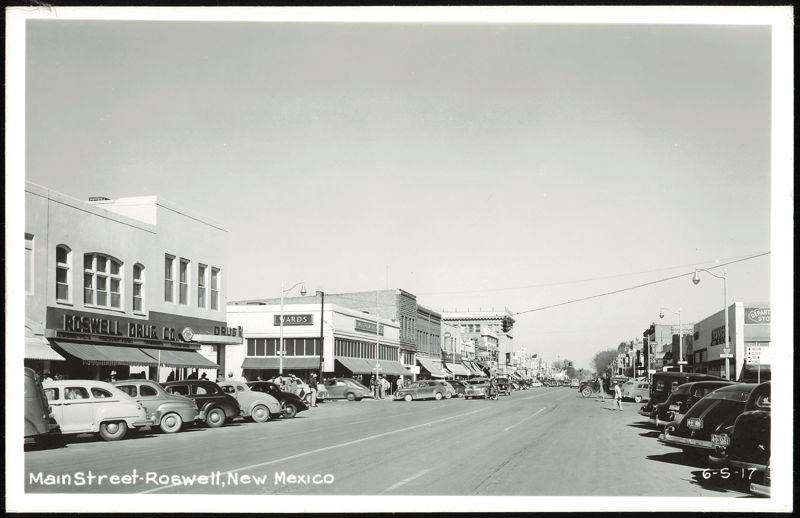 Main Street with Roswell Drug Co. and Montgomery Ward New Mexico