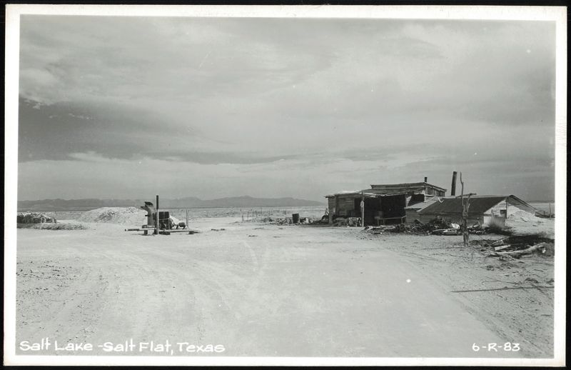 Arid Landscape of Salt Lake and Salt Flat with Buildings Texas