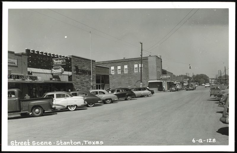 Stanton, Texas Street Scene with Vintage Cars and Businesses