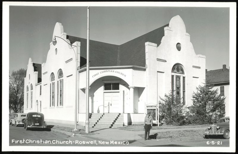 First Christian Church building with cars and man on sidewalk Roswell New Mexico