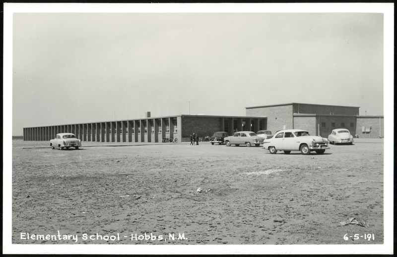 Elementary School Building and Cars in Dirt Lot, Hobbs, NM New Mexico