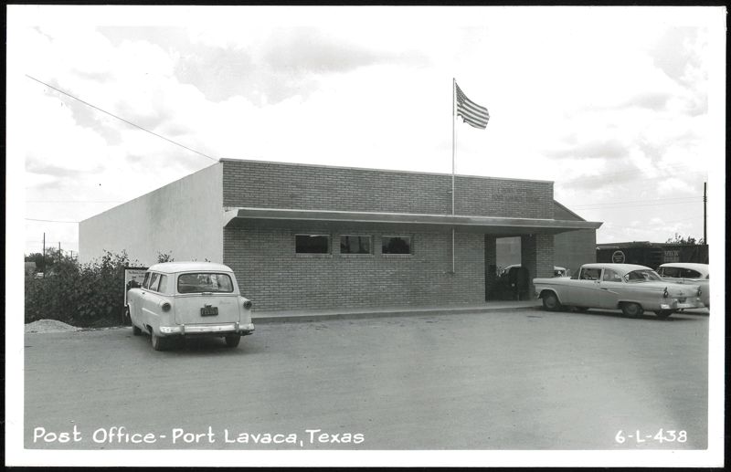 Post Office Building with Cars and US Flag, Port Lavaca Texas