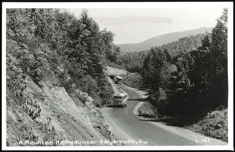 A Mountain Highway near Salyersville with two buses Kentucky