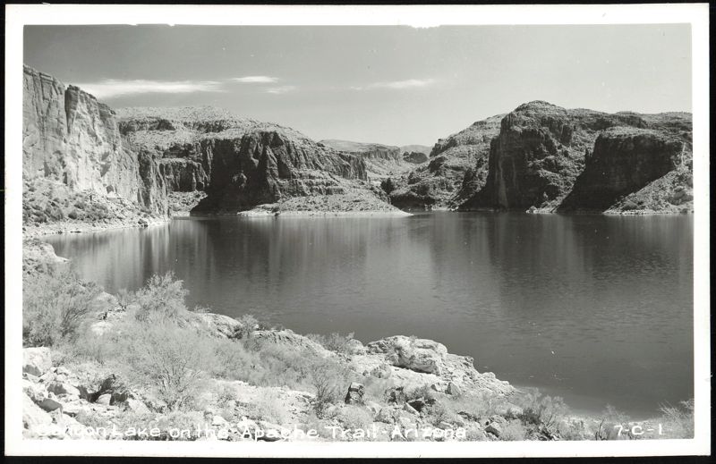 Canyon Lake on the Apache Trail, Arizona with Rocky Cliffs and Water Reflection