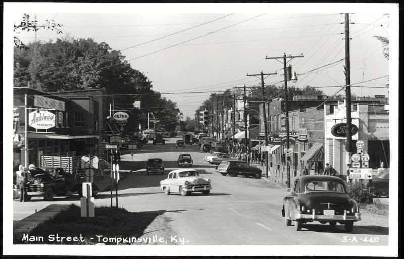 Main Street with Businesses and Cars Tompkinsville Kentucky
