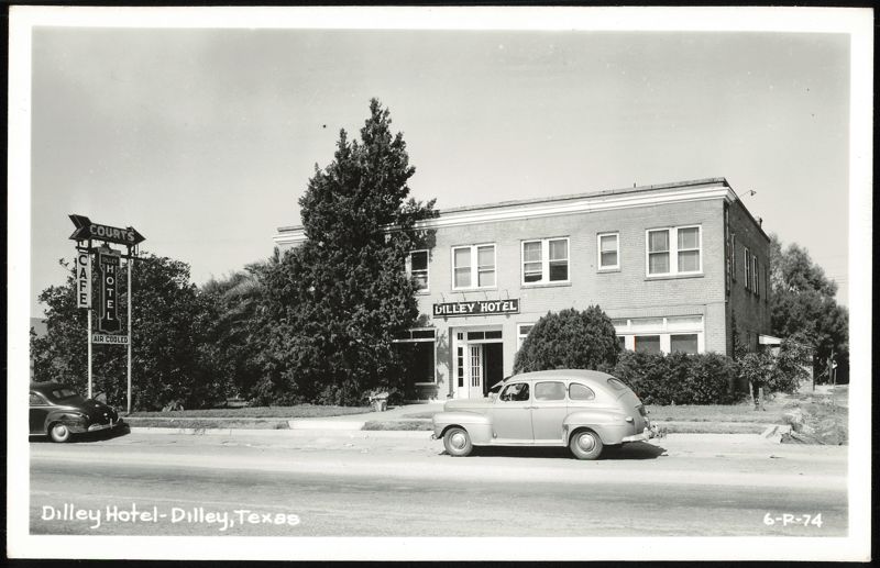 Dilley Hotel, Cafe, and Courts with Cars on Street Texas