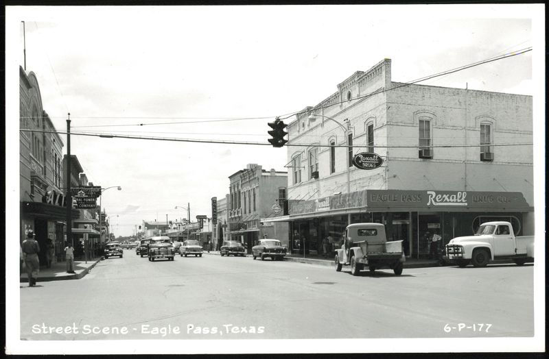 Street Scene with Rexall Drug Co. and Vintage Cars Eagle Pass Texas