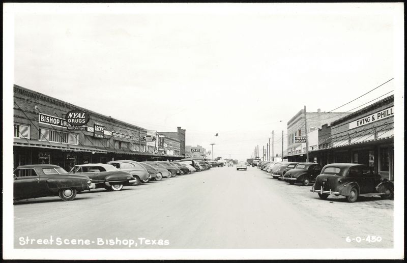 Street Scene with Parked Cars and Businesses Bishop Texas