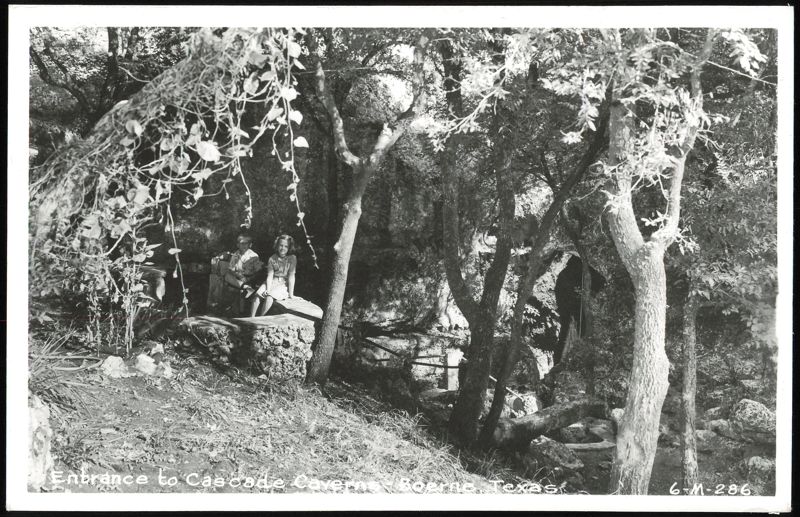 Entrance to Cascade Caverns with two children Boerne Texas