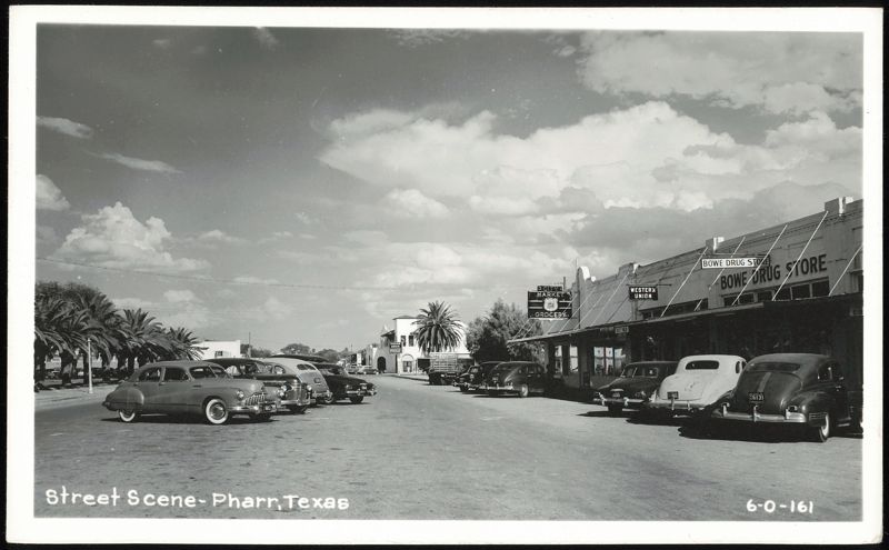 Street Scene with Vintage Cars, Bowe Drug Store, and City Market Grocery Pharr Texas