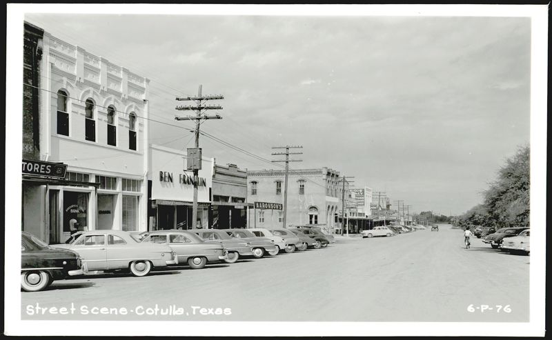 Downtown Street Scene with Parked Cars and Businesses Cotulla Texas