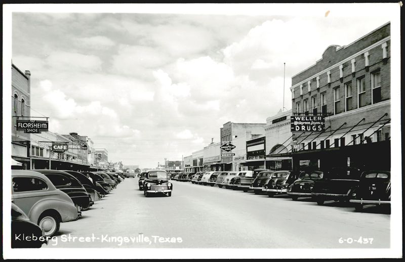 Kleberg Street, Kingsville, Texas - Downtown View with Vintage Cars and Shops