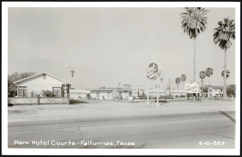 Park Hotel Courts with multiple signs and palm trees Falfurrias Texas
