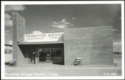 Frontier Drugs Storefront with Neon Sign Postcard