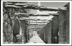 Alamo Arcade with stone walls and wooden beams Postcard