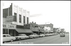 Downtown Street Scene with Businesses and Cars Postcard