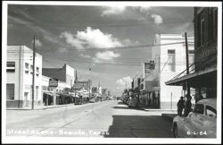 Street Scene with Businesses, Cars, and Pedestrians Postcard