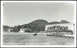 Ruidoso Junction with 'Year Around Playground' Sign Postcard