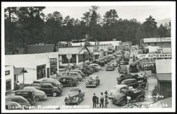 Downtown Ruidoso Street Scene with Vintage Cars and Shops Postcard