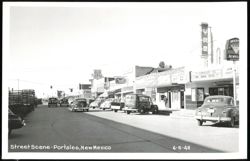 Street Scene with Businesses and Movie Theater Postcard