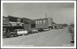 Stanton, Texas Street Scene with Vintage Cars and Businesses Postcard