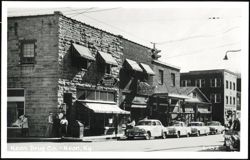 Main Street with Rexall Drugs and Wright's Jewelry Postcard