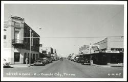 Street Scene with P. Hinojosa y Hnos and Starr Pharmacy Postcard