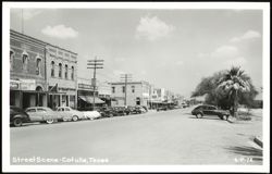 Downtown Cotulla, Texas Street Scene with Vintage Cars and Shops Postcard