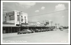 Street Scene with Gaddis Pharmacy and Central Power and Light Company Postcard