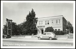 Dilley Hotel, Cafe, and Courts with Cars on Street Postcard