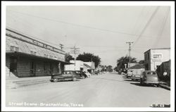 Street Scene with Petersen & Company and McCabe Drug Store Postcard