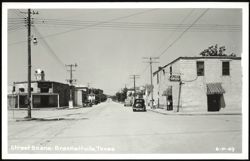 Main Street with First State Bank and McCabe's Drug Store Postcard