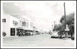 Street Scene with Texaco, Hotpoint, Philco, and US 83/TX 85 signs Postcard