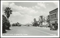 Downtown Street Scene with Palm Trees, Rexall Drugs, and Mobilgas Postcard