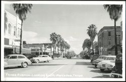 Texas Avenue Looking South with Palm Trees and Vintage Cars Postcard