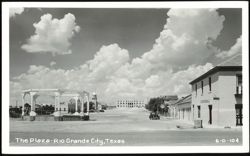 The Plaza with Gazebo, Church, and Businesses Postcard
