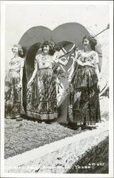 Three Women in Traditional Dresses at Charro Days Festival Postcard