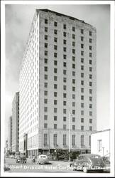 Robert Driscoll Hotel - Tall Building with Cars and Flag Postcard