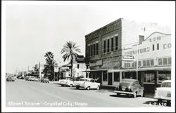 Street Scene with Rexall Drugs and L&W Furniture, Crystal City Postcard