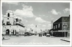 Houston Street Looking North, San Benito Bank & Trust Co. building, vintage cars Postcard