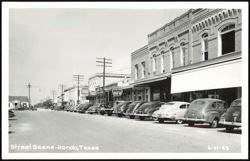 Street Scene with Parked Cars and Businesses Postcard